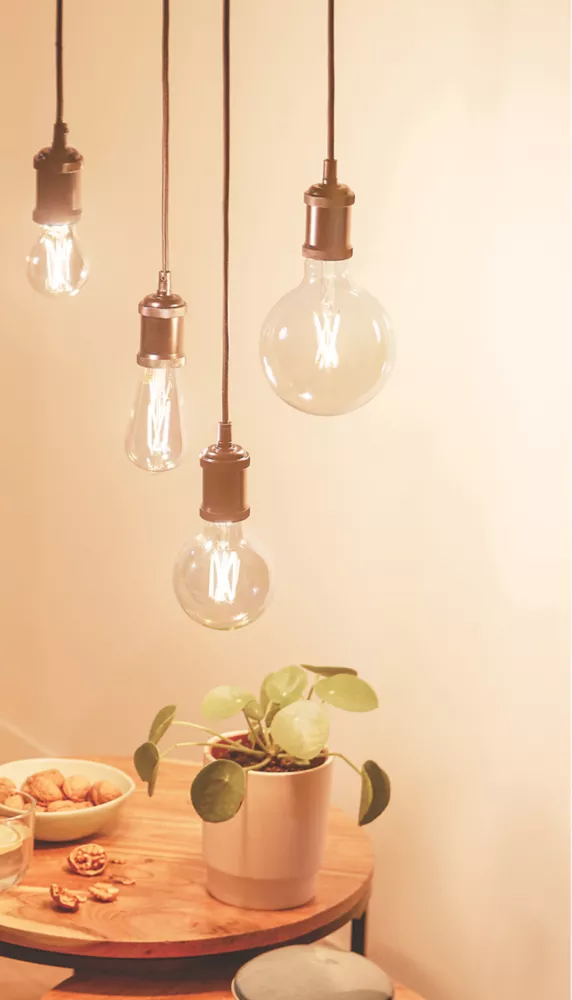 Philips Filament Amber A60 B22 BC Decorative LED Smart Light Bulb 7W 640lm - Image 2